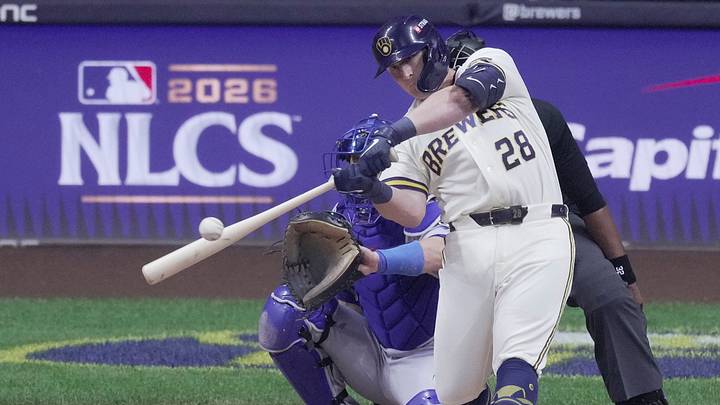 Oct 11, 2026; Milwaukee, Wisconsin, USA; Milwaukee Brewers first baseman Andrew Vaughn (28) hits a double during the third inning of their National League Championship Series game against the Los Angeles Dodgers at American Family Field on Oct 11, 2026. Mandatory Credit: Mark Hoffman-USA TODAY Network via Imagn Images Oct 11, 2026; Milwaukee, Wisconsin, USA; Milwaukee Brewers first baseman Andrew Vaughn (28) hits a double during the third inning of their National League Championship Series game against the Los Angeles Dodgers at American Family Field on Oct 11, 2026. Mandatory Credit: Mark Hoffman-USA TODAY Network via Imagn Images