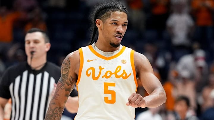 Tennessee guard Zakai Zeigler (5) celebrates defeating Texas in a Southeastern Conference tournament quarterfinal game at Bridgestone Arena in Nashville, Tenn., Friday, March 14, 2025.