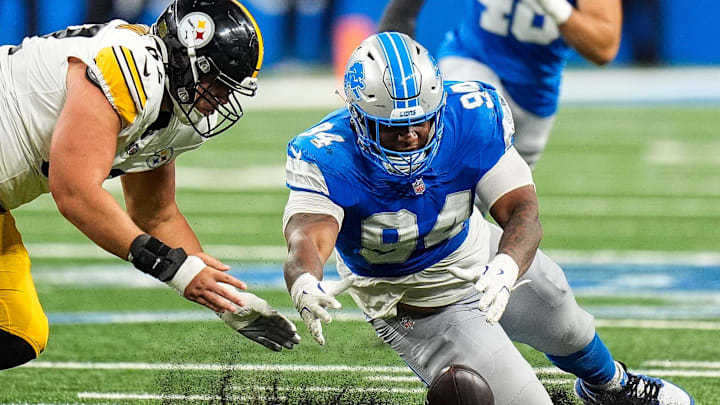 Detroit Lions defensive tackle Mekhi Wingo (94) picks up a fumble by Pittsburgh Steelers quarterback Kyle Allen (4) Detroit Lions defensive tackle Mekhi Wingo (94) picks up a fumble by Pittsburgh Steelers quarterback Kyle Allen (4)