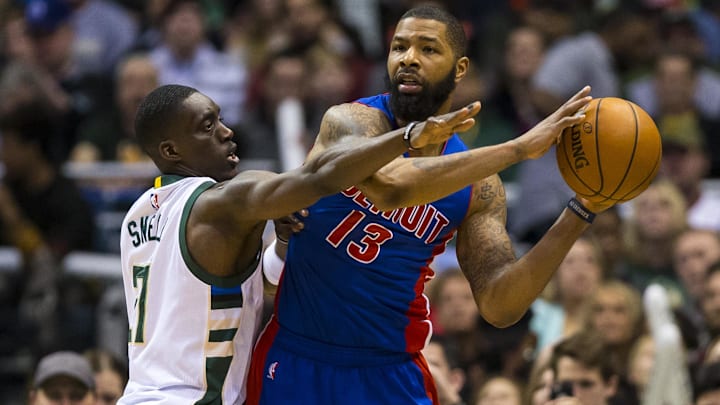 Mar 31, 2017; Milwaukee, WI, USA; Detroit Pistons forward Marcus Morris (13) passes the ball around Milwaukee Bucks guard Tony Snell (21) during overtime at BMO Harris Bradley Center. Milwaukee won 108-105. Mandatory Credit: Jeff Hanisch-Imagn Images Mar 31, 2017; Milwaukee, WI, USA; Detroit Pistons forward Marcus Morris (13) passes the ball around Milwaukee Bucks guard Tony Snell (21) during overtime at BMO Harris Bradley Center. Milwaukee won 108-105. Mandatory Credit: Jeff Hanisch-Imagn Images