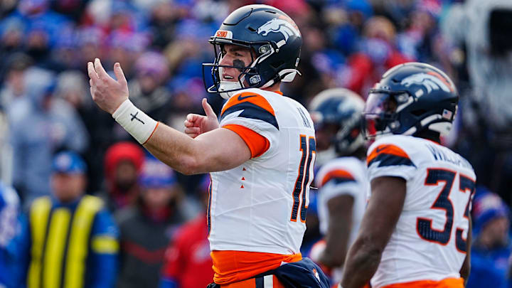 Denver Broncos quarterback Bo Nix (10) signals to the players before the snap during the first half of the Buffalo Bills wild card game against the Denver Broncos at Highmark Stadium in Orchard Park on Jan. 12, 2025. Denver Broncos quarterback Bo Nix (10) signals to the players before the snap during the first half of the Buffalo Bills wild card game against the Denver Broncos at Highmark Stadium in Orchard Park on Jan. 12, 2025.