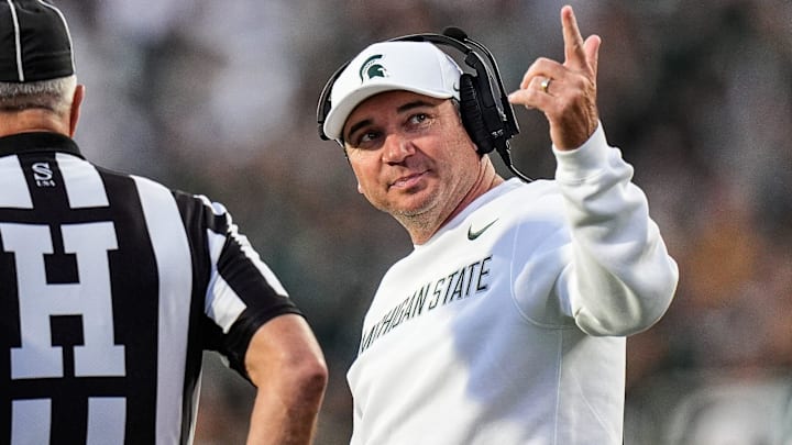 Michigan State head coach Jonathan Smith talks to a referee regarding a call during the first half against Western Michigan at Spartan Stadium in East Lansing on Friday, August 29, 2025. Michigan State head coach Jonathan Smith talks to a referee regarding a call during the first half against Western Michigan at Spartan Stadium in East Lansing on Friday, August 29, 2025.