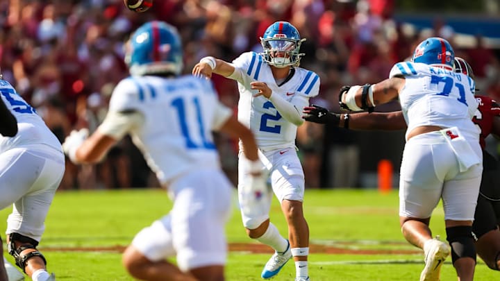 Oct 5, 2024; Columbia, South Carolina, USA; Mississippi Rebels quarterback Jaxson Dart (2) passes against the South Carolina Gamecocks in the first quarter at Williams-Brice Stadium. Mandatory Credit: Jeff Blake-Imagn Images