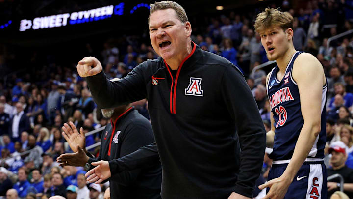 Mar 27, 2025; Newark, NJ, USA; Arizona Wildcats head coach Tommy Lloyd during the second half against the Duke Blue Devils during an East Regional semifinal of the 2025 NCAA tournament at Prudential Center. Mandatory Credit: Vincent Carchietta-Imagn Images Mar 27, 2025; Newark, NJ, USA; Arizona Wildcats head coach Tommy Lloyd during the second half against the Duke Blue Devils during an East Regional semifinal of the 2025 NCAA tournament at Prudential Center. Mandatory Credit: Vincent Carchietta-Imagn Images