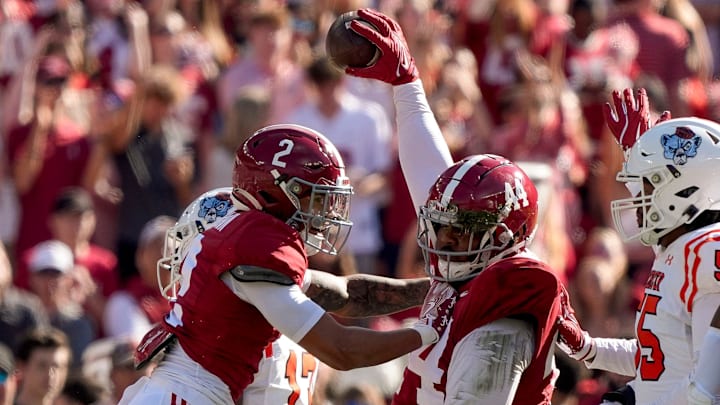 Nov 16, 2024; Tuscaloosa, AL, USA; Alabama Crimson Tide defensive back Zabien Brown (2) and Alabama Crimson Tide defensive lineman Damon Payne Jr. (44) celebrate after Payne recovered a Mercer fumble at Bryant-Denny Stadium. Mandatory Credit: Gary Cosby Jr.-Tuscaloosa News