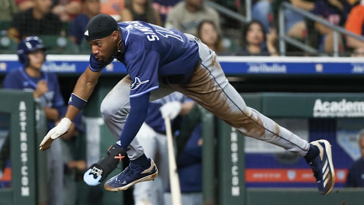 Tampa Bay Rays left fielder Chandler Simpson (14) steals third base then scores a run on Houston Astros catcher Yainer Diaz (21) (not pictured) errant throw in the fourth inning at Daikin Park. Tampa Bay Rays left fielder Chandler Simpson (14) steals third base then scores a run on Houston Astros catcher Yainer Diaz (21) (not pictured) errant throw in the fourth inning at Daikin Park.