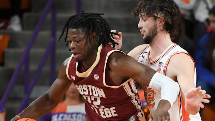 Boston College Eagles forward Jayden Hastings (22) is defended by Clemson Tigers center Carter Welling (22) Tuesday, Jan. 13, 2026, during the NCAA men’s basketball game at Littlejohn Coliseum in Clemson, South Carolina.