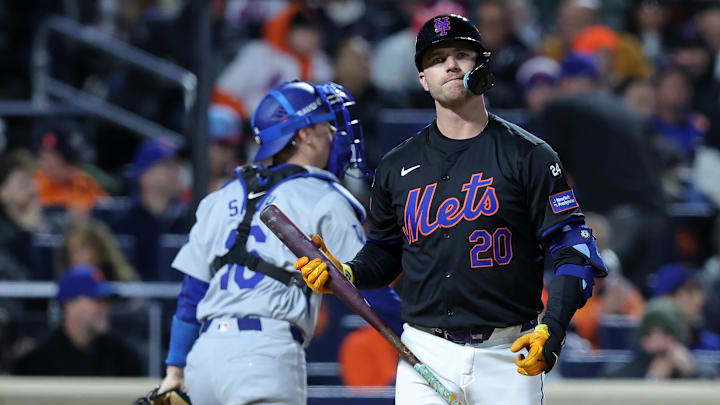 Oct 16, 2024; New York City, New York, USA; New York Mets first base Pete Alonso (20) reacts after striking out against the Los Angeles Dodgers in the first inning during game three of the NLCS for the 2024 MLB playoffs at Citi Field. Mandatory Credit: Brad Penner-Imagn Images