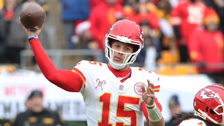 Dec 25, 2024; Pittsburgh, Pennsylvania, USA;  Kansas City Chiefs quarterback Patrick Mahomes (15) passes against the Pittsburgh Steelers during the second quarter at Acrisure Stadium. Mandatory Credit: Charles LeClaire-Imagn Images