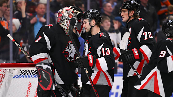 Buffalo Sabres players Ukko-Pekka Luukkonen, Josh Norris and Tage Thompson