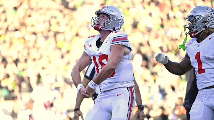 Oct 12, 2024; Eugene, Oregon, USA; Ohio State Buckeyes quarterback Will Howard (18) celebrates after scoring a touchdown against the Oregon Ducks. Oct 12, 2024; Eugene, Oregon, USA; Ohio State Buckeyes quarterback Will Howard (18) celebrates after scoring a touchdown against the Oregon Ducks.