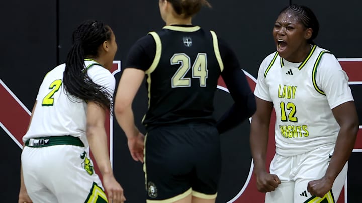 Ontario Christian's Tati Griffin (12) and Dani Robinson enjoy a moment during their team's 61-44 win over Archbishop Mitty in the 4th Sabrina Ionecus Showcase in Concord Ontario Christian's Tati Griffin (12) and Dani Robinson enjoy a moment during their team's 61-44 win over Archbishop Mitty in the 4th Sabrina Ionecus Showcase in Concord
