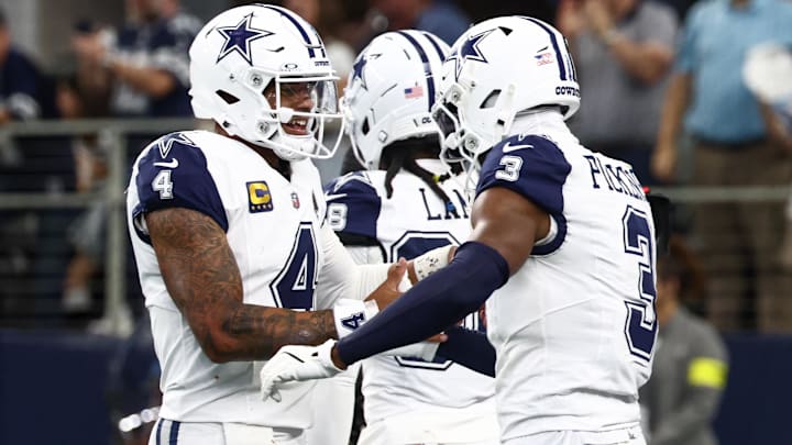 Dallas Cowboys QB Dak Prescott and WR George Pickens celebrate after a touchdown against the Washington Commanders.