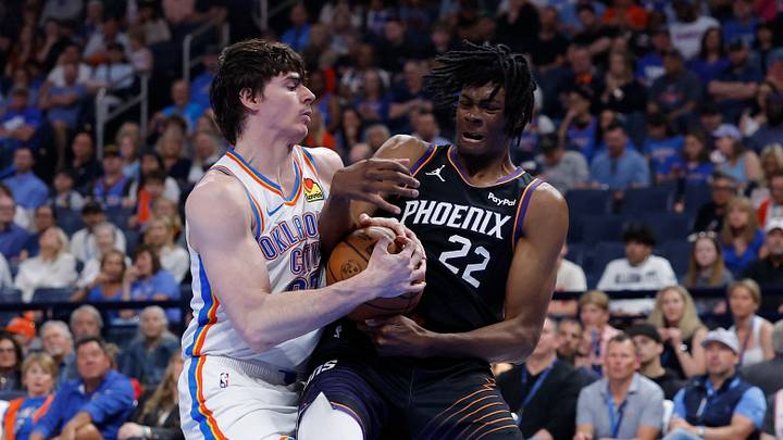 Apr 12, 2026; Oklahoma City, Oklahoma, USA; Oklahoma City Thunder forward Brooks Barnhizer (23) and Phoenix Suns forward CJ Huntley (22) fight for a loose ball during the first quarter at Paycom Center. Mandatory Credit: Alonzo Adams-Imagn Images Apr 12, 2026; Oklahoma City, Oklahoma, USA; Oklahoma City Thunder forward Brooks Barnhizer (23) and Phoenix Suns forward CJ Huntley (22) fight for a loose ball during the first quarter at Paycom Center. Mandatory Credit: Alonzo Adams-Imagn Images