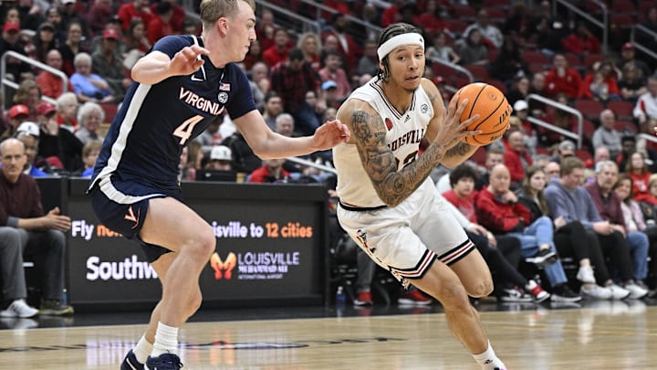 Jan 27, 2024; Louisville, Kentucky, USA;  Louisville Cardinals guard Tre White (22) drives to the