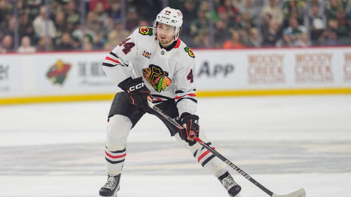 Mar 19, 2026; Saint Paul, Minnesota, USA; Chicago Blackhawks defenseman Wyatt Kaiser (44) shoots from the blue line against the Minnesota Wild in the first period at Grand Casino Arena. Mandatory Credit: Matt Blewett-Imagn Images