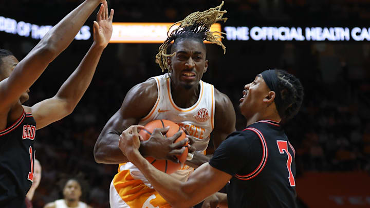 Jan 15, 2025; Knoxville, Tennessee, USA; Tennessee Volunteers guard Jahmai Mashack (15) drives against Georgia Bulldogs guard Tyrin Lawrence (7) during the first half at Thompson-Boling Arena at Food City Center. Mandatory Credit: Randy Sartin-Imagn Images
