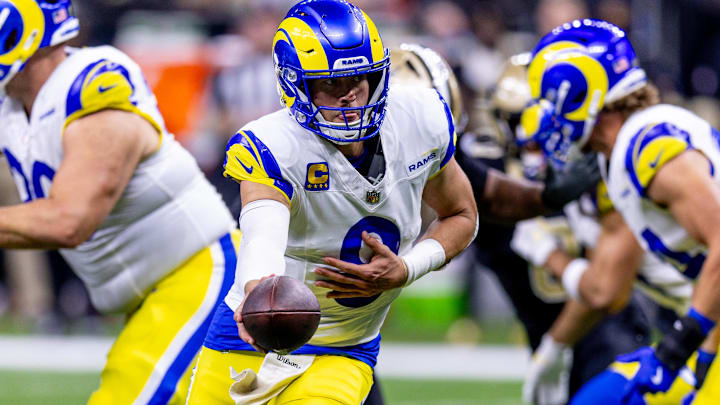 Dec 1, 2024; New Orleans, Louisiana, USA;  Los Angeles Rams quarterback Matthew Stafford (9) drops back to pass against the New Orleans Saints during the second half at Caesars Superdome. Mandatory Credit: Stephen Lew-Imagn Images