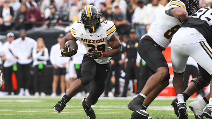 Oct 25, 2025; Nashville, Tennessee, USA;  Missouri Tigers running back Ahmad Hardy (29) runs with the ball against the Vanderbilt Commodores during the second half at FirstBank Stadium. Mandatory Credit: Steve Roberts-Imagn Images