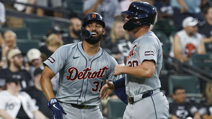 Aug 24, 2024; Chicago, Illinois, USA; Detroit Tigers first baseman Spencer Torkelson (20) celebrates with outfielder Riley Greene (31) after they both scored against the Chicago White Sox during the fourth inning at Guaranteed Rate Field.