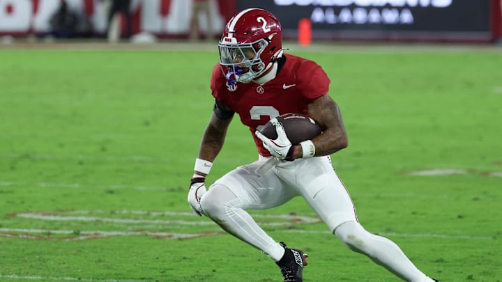 Nov 8, 2025; Tuscaloosa, Alabama, USA; Alabama Crimson Tide wide receiver Ryan Williams (2) carries the ball after a reception against the Louisiana State Tigers during the fourth quarter of the game at Saban Field at Bryant-Denny Stadium. Mandatory Credit: David Leong-Imagn Images
