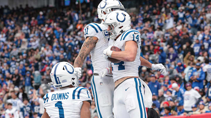 Dec 29, 2024; East Rutherford, New Jersey, USA; Indianapolis Colts wide receiver Alec Pierce (14) celebrates his touchdown reception with teammates during the second half against the New York Giants at MetLife Stadium. Mandatory Credit: Vincent Carchietta-Imagn Images Dec 29, 2024; East Rutherford, New Jersey, USA; Indianapolis Colts wide receiver Alec Pierce (14) celebrates his touchdown reception with teammates during the second half against the New York Giants at MetLife Stadium. Mandatory Credit: Vincent Carchietta-Imagn Images