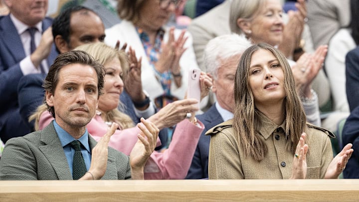 Maria Sharapova and Alexander Gilkes in the Royal Box for the Daniil Medvedev and Alexandre Muller of France (both not shown) match on day three of The Championships at All England Lawn Tennis and Croquet Club. Maria Sharapova and Alexander Gilkes in the Royal Box for the Daniil Medvedev and Alexandre Muller of France (both not shown) match on day three of The Championships at All England Lawn Tennis and Croquet Club.