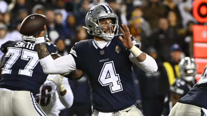 Jan 7, 2024; Landover, Maryland, USA; Dallas Cowboys quarterback Dak Prescott (4) attempts a pass against the Washington Commanders during the first half at FedExField. Mandatory Credit: Brad Mills-USA TODAY Sports