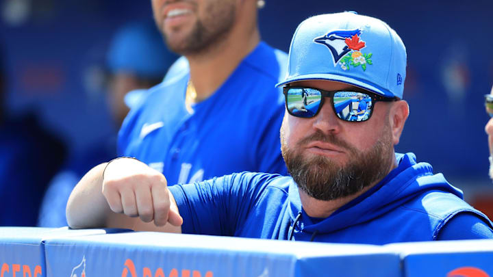 Mar 3, 2026; Dunedin, FL, USA; Toronto Blue Jays manager John Schneider (14) looks on against Team Canada at TD Ballpark. 