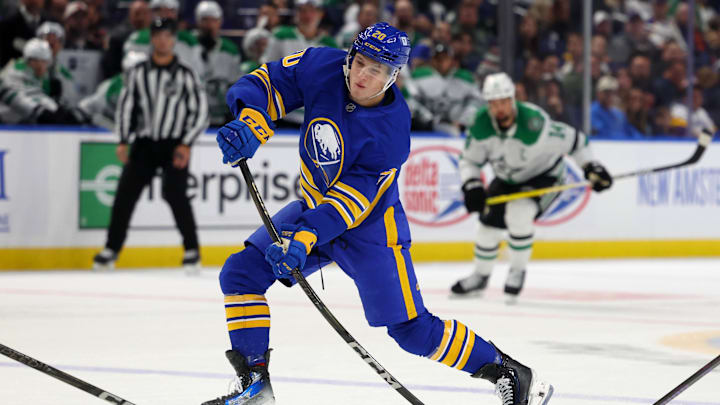 Oct 22, 2024; Buffalo, New York, USA;  Buffalo Sabres center Jiri Kulich (20) takes a shot on goal during the second period against the Dallas Stars at KeyBank Center. Mandatory Credit: Timothy T. Ludwig-Imagn Images