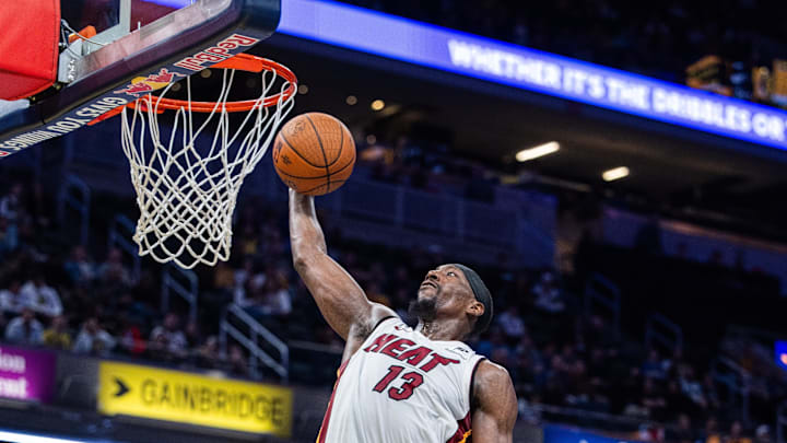 Nov 15, 2024; Indianapolis, Indiana, USA; Miami Heat center Bam Adebayo (13) shoots the ball while Indiana Pacers forward Obi Toppin (1) defends in the second half at Gainbridge Fieldhouse. 