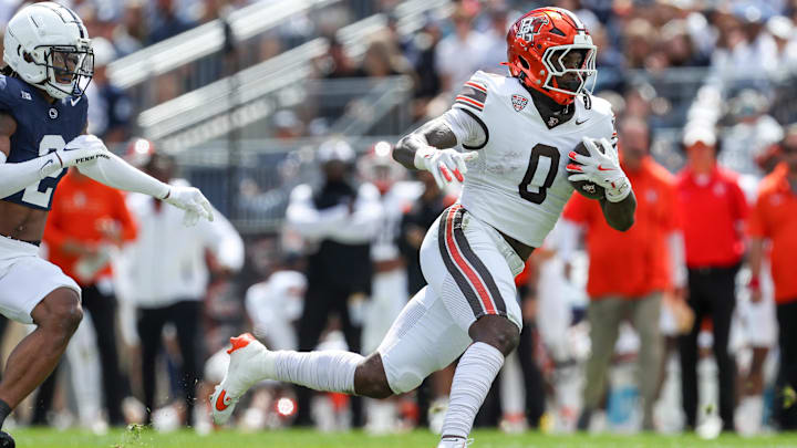 Sep 7, 2024; University Park, Pennsylvania, USA; Bowling Green Falcons tight end Harold Fannin Jr (0) runs with the ball during the second quarter against the Penn State Nittany Lions at Beaver Stadium. Mandatory Credit: Matthew O'Haren-Imagn Images