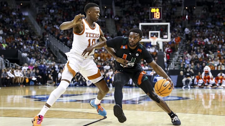 Texas Longhorns guard Sir'Jabari Rice defends dribbles the ball in the first half