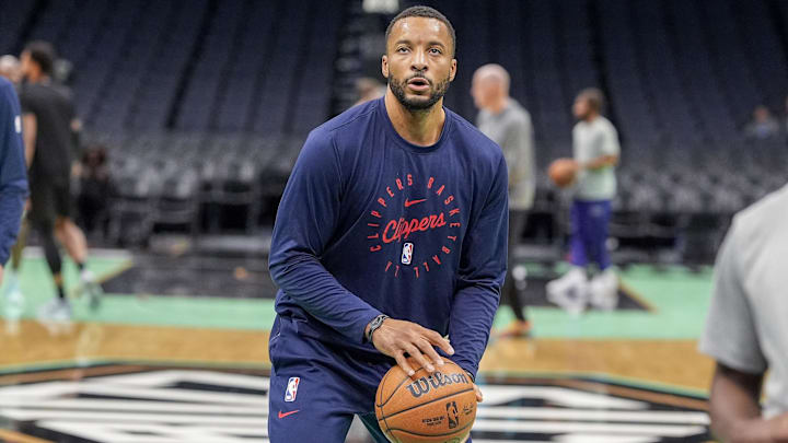 Jan 31, 2025; Charlotte, North Carolina, USA; LA Clippers guard Norman Powell (24) shoots during pregame warm ups at Spectrum Center. Mandatory Credit: Jim Dedmon-Imagn Images