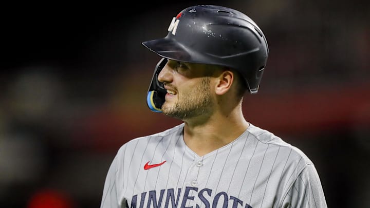 Sep 18, 2023; Cincinnati, Ohio, USA; Minnesota Twins left fielder Matt Wallner (38) walks off the field after striking out in the seventh inning against the Cincinnati Reds at Great American Ball Park. Mandatory Credit: Katie Stratman-Imagn Images