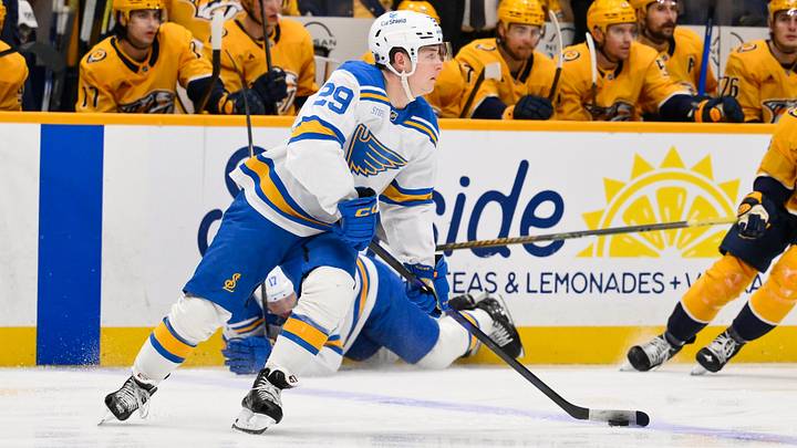 Feb 2, 2026; Nashville, Tennessee, USA;  St. Louis Blues right wing Jonatan Berggren (29) skates with the puck against the Nashville Predators during the second period at Bridgestone Arena. Mandatory Credit: Steve Roberts-Imagn Images