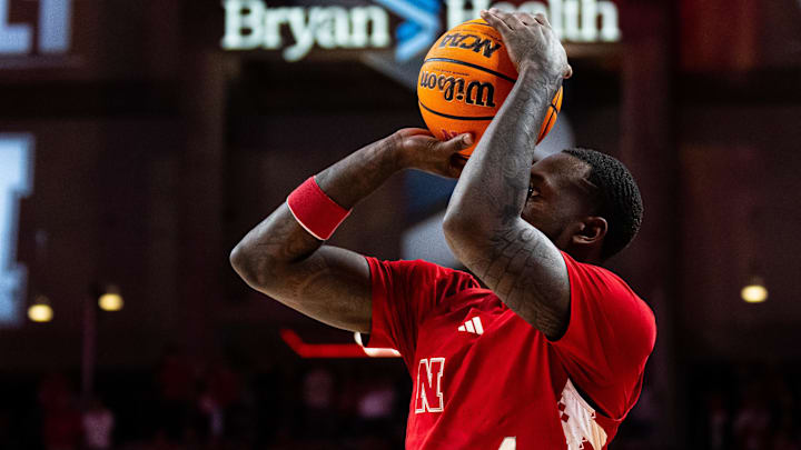 Feb 13, 2025; Lincoln, Nebraska, USA; Nebraska Cornhuskers forward Juwan Gary (4) shoots a three point basket against the Maryland Terrapins during the first half at Pinnacle Bank Arena.