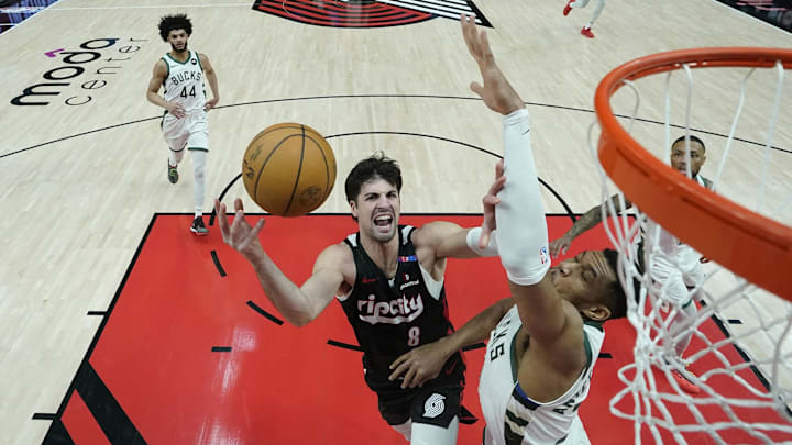 Jan 28, 2025; Portland, Oregon, USA; Portland Trail Blazers small forward Deni Avdija (8) shoots the ball against Milwaukee Bucks power forward Giannis Antetokounmpo (34) during the first half at Moda Center. Mandatory Credit: Soobum Im-Imagn Images Jan 28, 2025; Portland, Oregon, USA; Portland Trail Blazers small forward Deni Avdija (8) shoots the ball against Milwaukee Bucks power forward Giannis Antetokounmpo (34) during the first half at Moda Center. Mandatory Credit: Soobum Im-Imagn Images