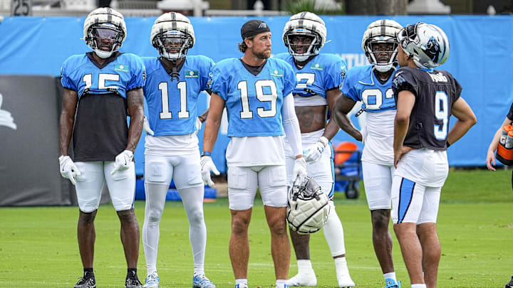 Jul 30, 2024; Charlotte, NC, USA; Carolina Panthers wide receiver Jonathan Mingo (15), wide receiver Ihmir Smith-Marsette (11), wide receiver Adam Thielen (19), wide receiver Deven Thompkins (12), wide receiver David Moore (83) and quarterback Bryce Young (9) during training camp at Carolina Panthers Practice Fields. Mandatory Credit: Jim Dedmon-USA TODAY Sports
