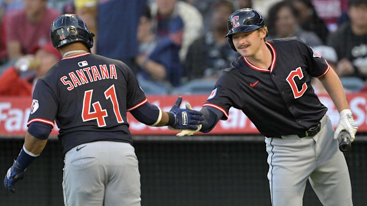 Apr 5, 2025; Anaheim, California, USA; Cleveland Guardians first baseman Carlos Santana (41) is congratulated by designated hitter Kyle Manzardo (9) after hitting a solo home run in the first inning against the Los Angeles Angels at Angel Stadium. Mandatory Credit: Jayne Kamin-Oncea-Imagn Images Apr 5, 2025; Anaheim, California, USA; Cleveland Guardians first baseman Carlos Santana (41) is congratulated by designated hitter Kyle Manzardo (9) after hitting a solo home run in the first inning against the Los Angeles Angels at Angel Stadium. Mandatory Credit: Jayne Kamin-Oncea-Imagn Images