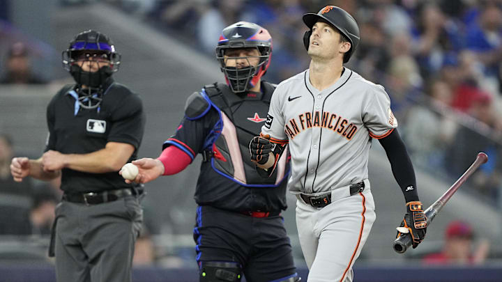 Jul 18, 2025; Toronto, Ontario, CAN; San Francisco Giants right fielder Mike Yastrzemski (5) reacts after striking out against the Toronto Blue Jays during the fifth inning at Rogers Centre. Jul 18, 2025; Toronto, Ontario, CAN; San Francisco Giants right fielder Mike Yastrzemski (5) reacts after striking out against the Toronto Blue Jays during the fifth inning at Rogers Centre.