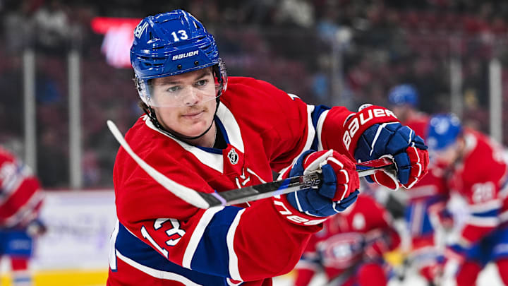 Nov 23, 2024; Montreal, Quebec, CAN; Montreal Canadiens right wing Cole Caufield (13) looks on during warm-up before the game against the Las Vegas Golden Knights at Bell Centre. Mandatory Credit: David Kirouac-Imagn Images