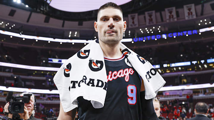 Jan 14, 2026; Chicago, Illinois, USA; Chicago Bulls center Nikola Vucevic (9) smiles as he walks off the court after an NBA game against the Utah Jazz at United Center. Mandatory Credit: Kamil Krzaczynski-Imagn Images