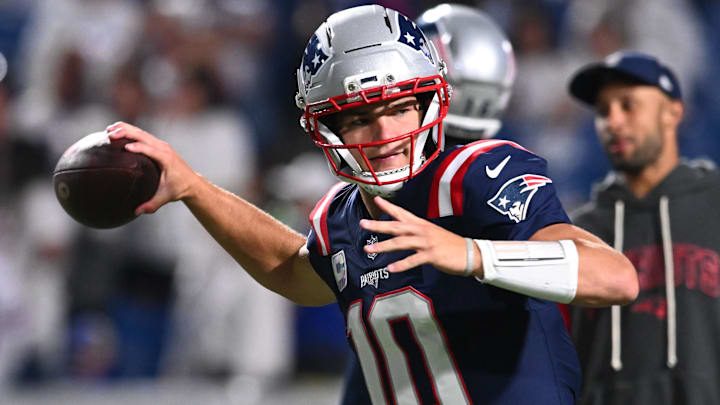 Oct 5, 2025; Orchard Park, New York, USA;New England Patriots quarterback Drake Maye (10) practices before the game at Highmark Stadium. Mandatory Credit: Mark Konezny-Imagn Images