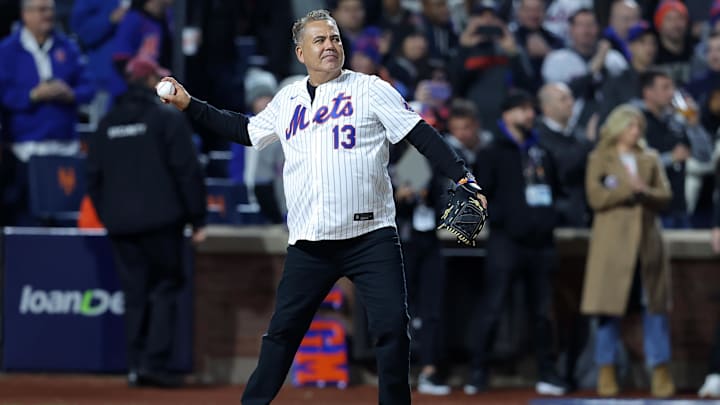 Oct 17, 2024; New York City, New York, USA; Former New York Mets Edgardo Alfonzo throws out the ceremonial first pitch before game four of the NLCS for the 2024 MLB playoffs at Citi Field. Mandatory Credit: Brad Penner-Imagn Images