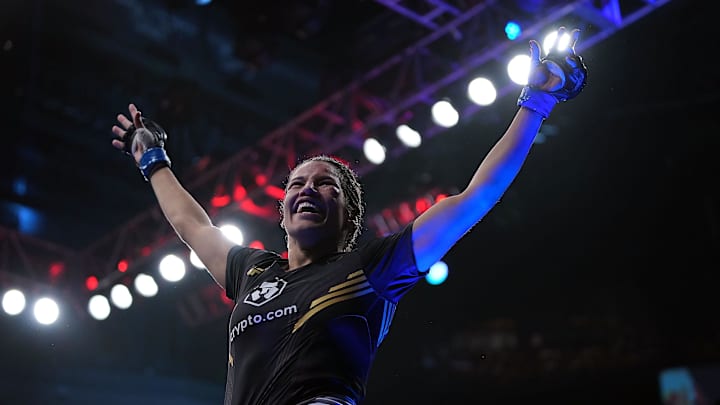Dec 11, 2021; Las Vegas, Nevada, USA; Julianna Pena celebrates her victory by submission against