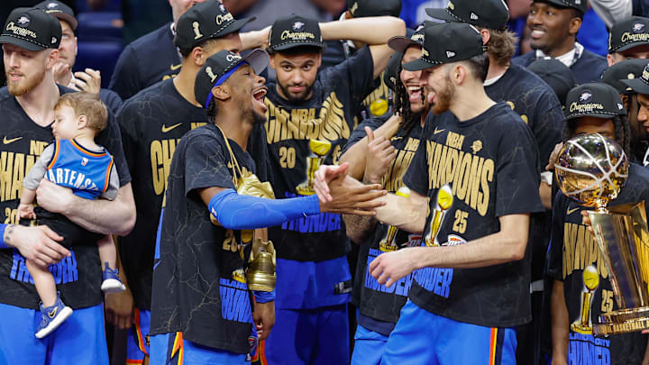 Jun 22, 2025; Oklahoma City, Oklahoma, USA; Oklahoma City Thunder guard Shai Gilgeous-Alexander (2) and Oklahoma City Thunder forward Chet Holmgren (7) celebrate after their team defeated the Indiana Pacers in game seven of the 2025 NBA Finals at Paycom Center. Mandatory Credit: Alonzo Adams-Imagn Images