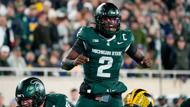 Oct 25, 2025; East Lansing, Michigan, USA; Michigan State Spartans quarterback Aidan Chiles (2) calls a play at the line of scrimmage against the Michigan Wolverines during the first half at Spartan Stadium. Mandatory Credit: Brendan Mullin-Imagn Images