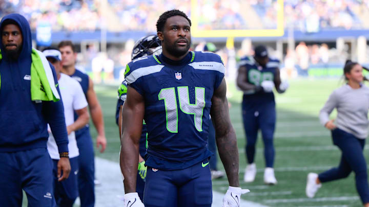 Sep 10, 2023; Seattle, Washington, USA; Seattle Seahawks wide receiver DK Metcalf (14) walks off the field during halftime against the Los Angeles Rams at Lumen Field. Mandatory Credit: Steven Bisig-Imagn Images