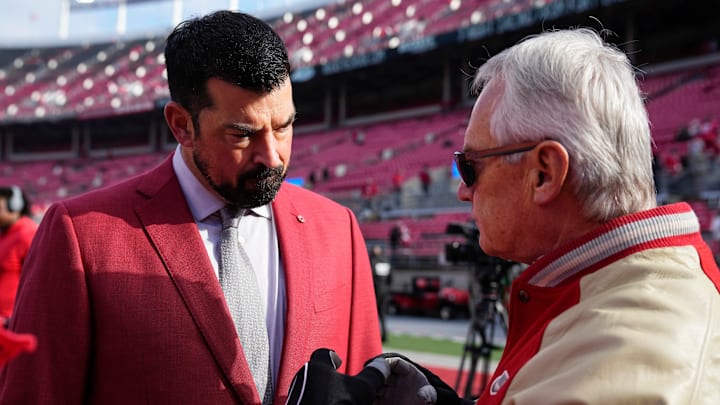 Ohio State Buckeyes head coach Ryan Day talks to former head coach and current Ohio lieutenant governor Jim Tressel prior to the NCAA football game against the Rutgers Scarlet Knights at Ohio Stadium in Columbus on Nov. 22, 2025.